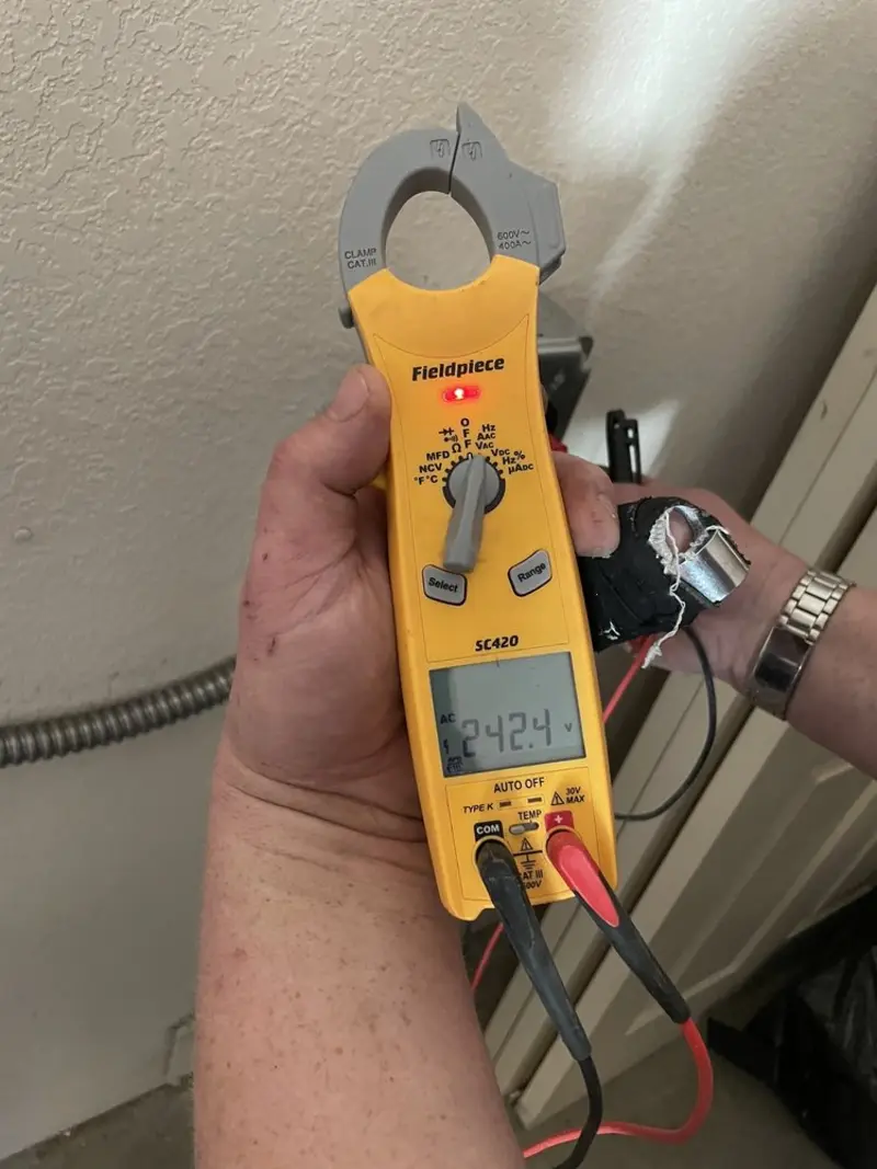 Voltage testing with clamp meter during Generator Installation in Great Falls